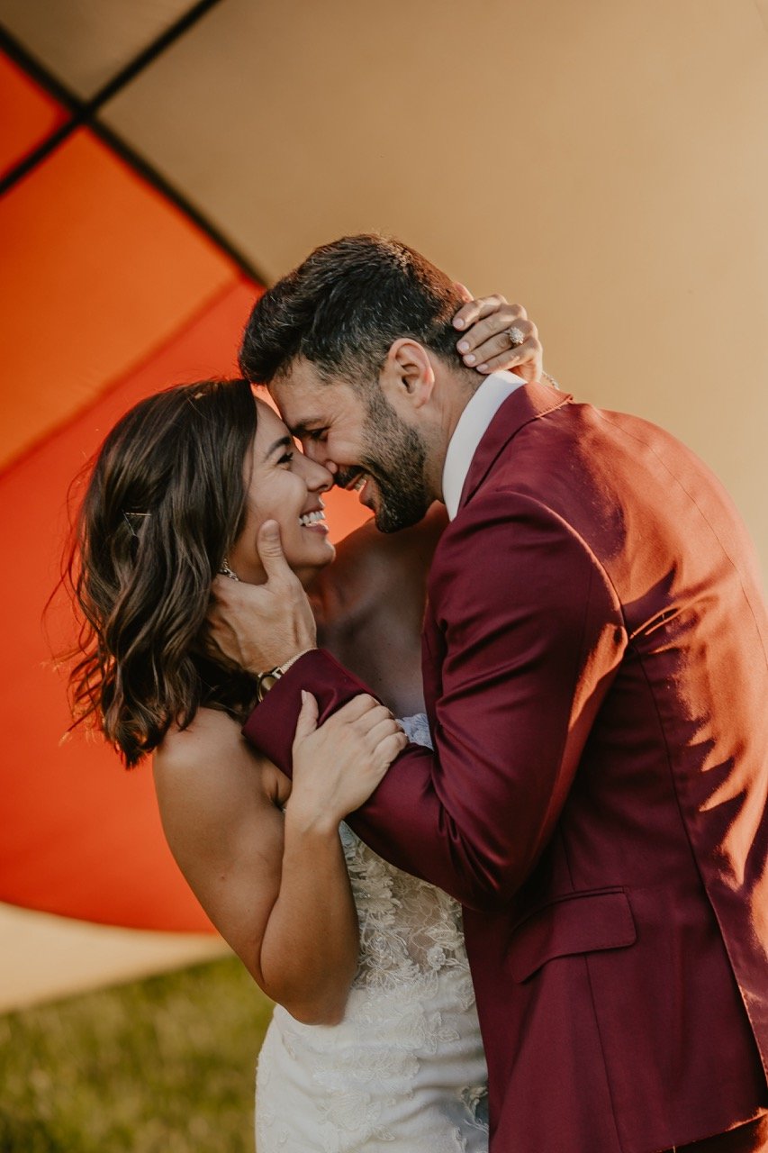 new-england-hot-air-balloon-elopement-couple-laughing.jpeg